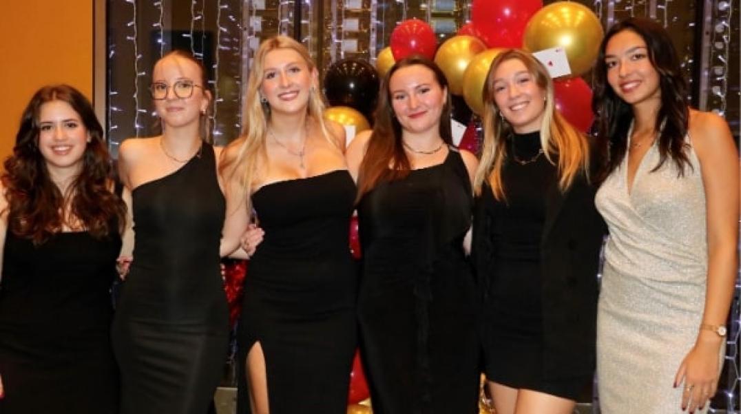 A group of women posing for a photo