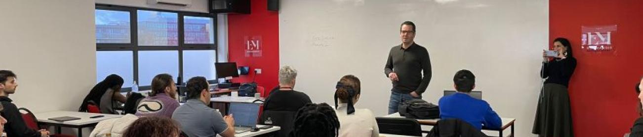 Professor in front of students Professor in front of students