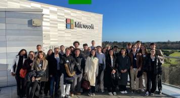 Group pic of students in front of Microsoft HeadQuarters