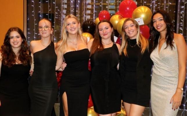 A group of women posing for a photo