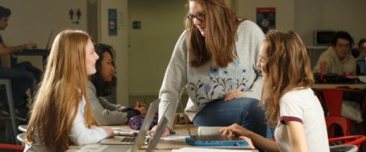 Students working in cafeteria